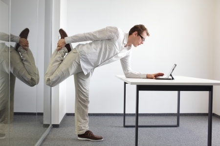 Stretch often while at work to prevent bad posture and injury