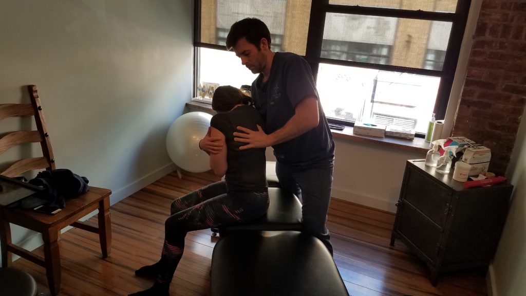 Dr. Mike Distler performing Active Release Technique on a patient at Physio Logic in Downtown Brooklyn