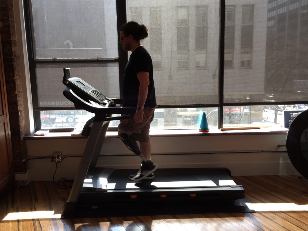 Gwen Le Pape testing his prosthetic on the treadmill.