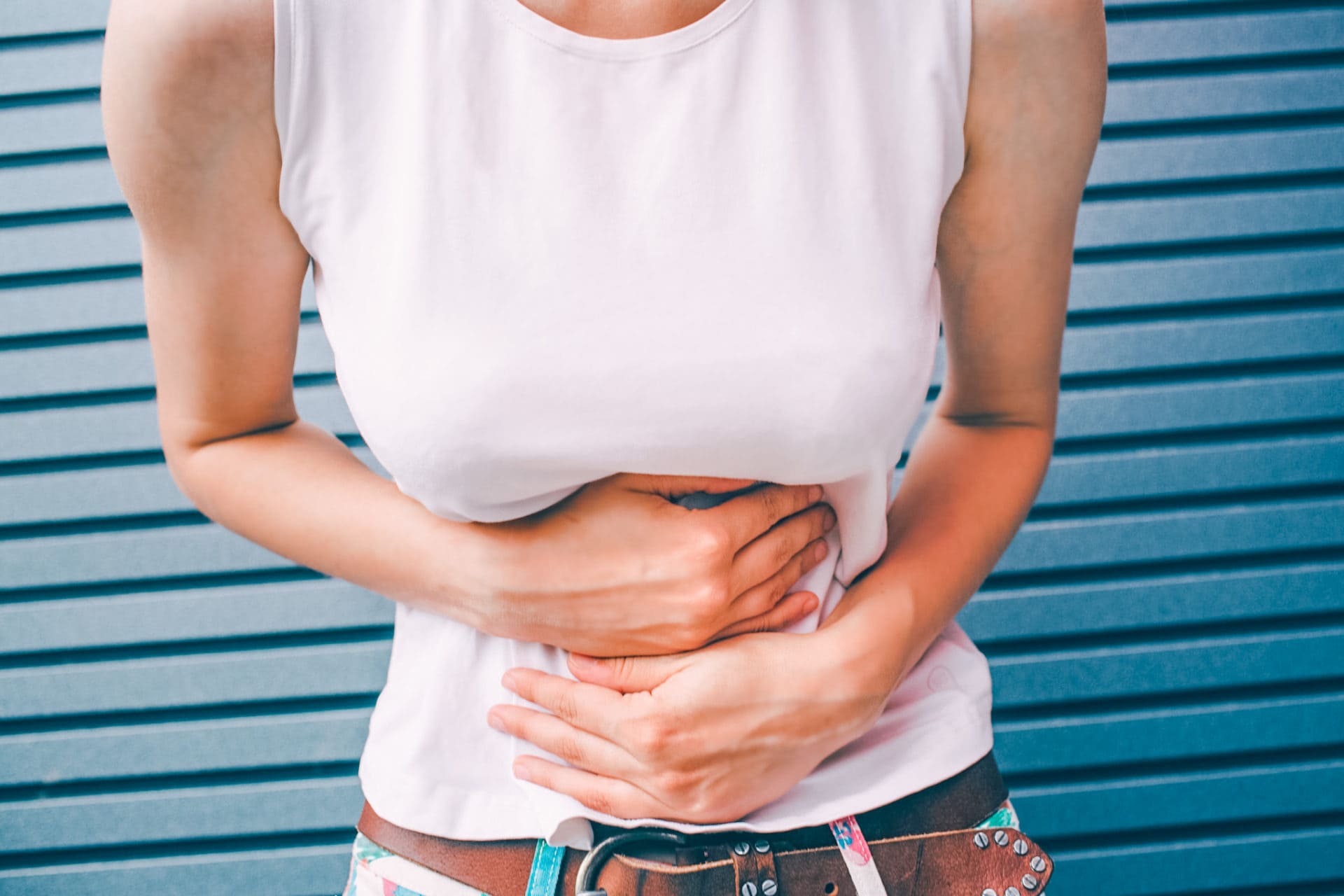 Women in distress from IBS. What is IBS? What are some IBS Symptoms? What is IBS Treatment?