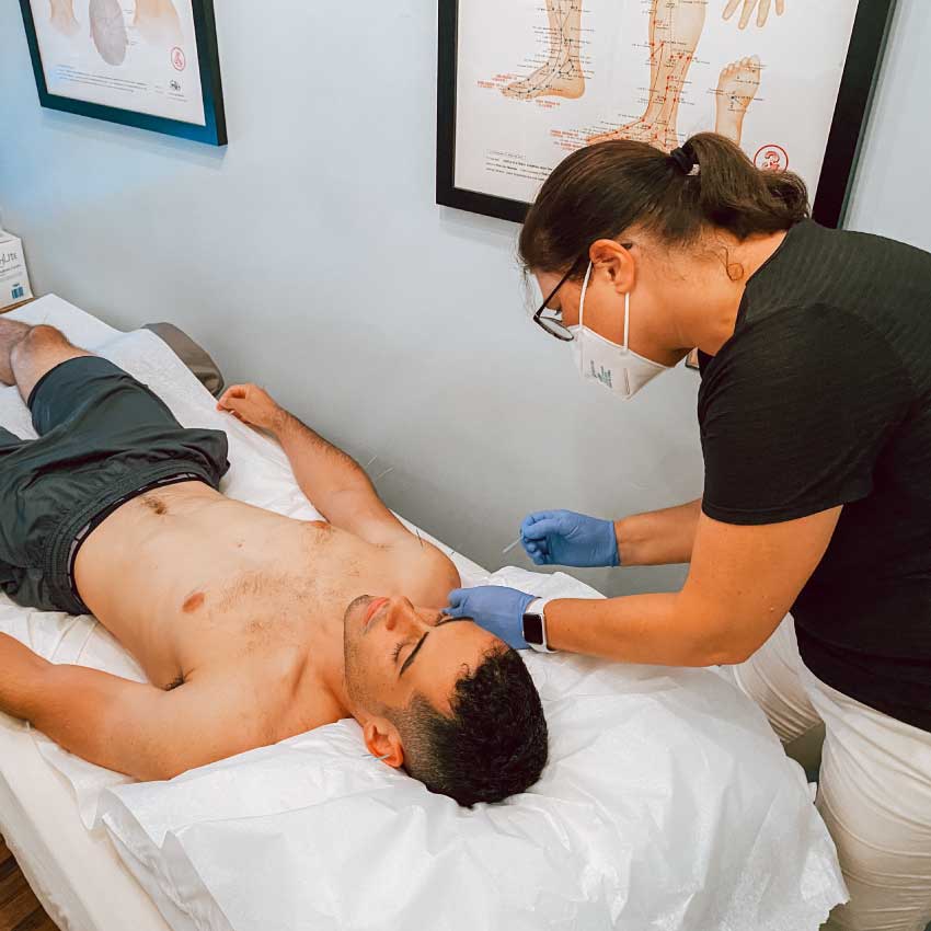 Man getting acupuncture for anxiety at Physio Logic NYC in Brooklyn, NY.