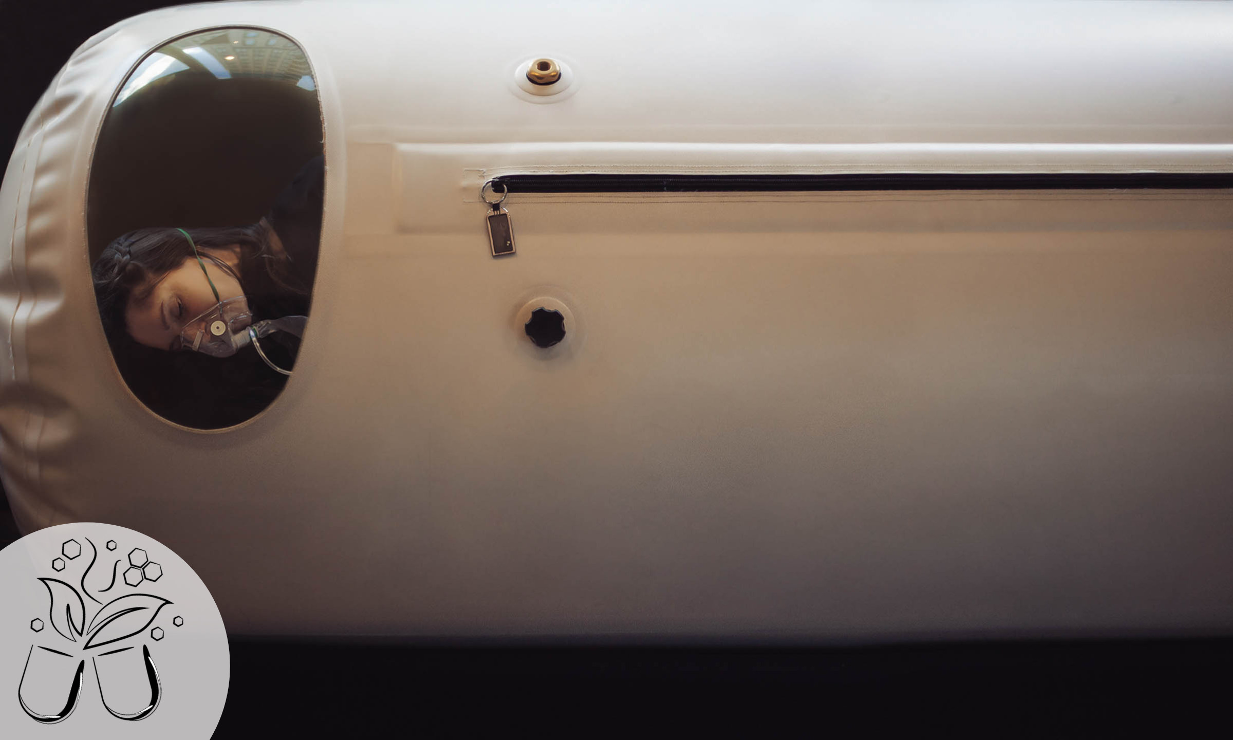A patient undergoing treatment in a hyperbaric chamber for concussion recovery.